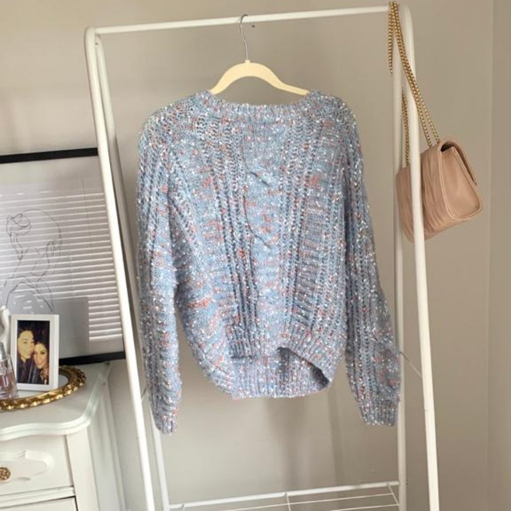Light blue sweater